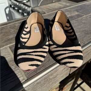 Jessica Simpson Brinley knit ballet flats with a black and beige zebra print.